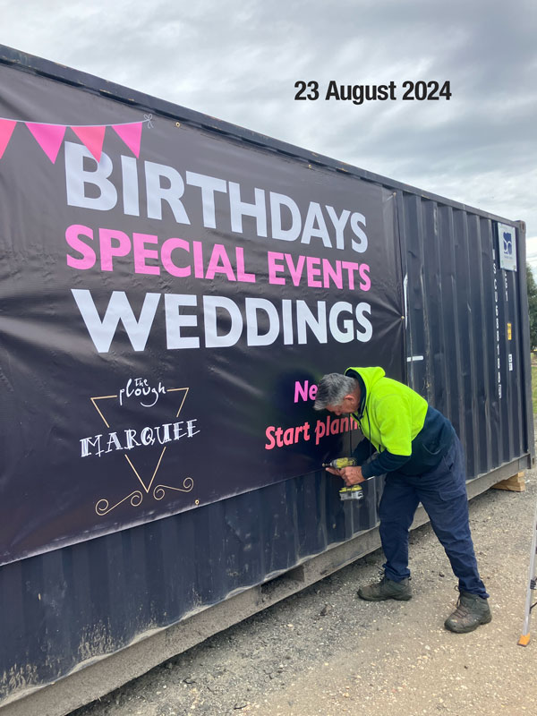 23 August 2024: banners arrive for the container